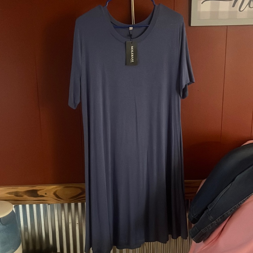Bought for a wedding and decided to wear something else.